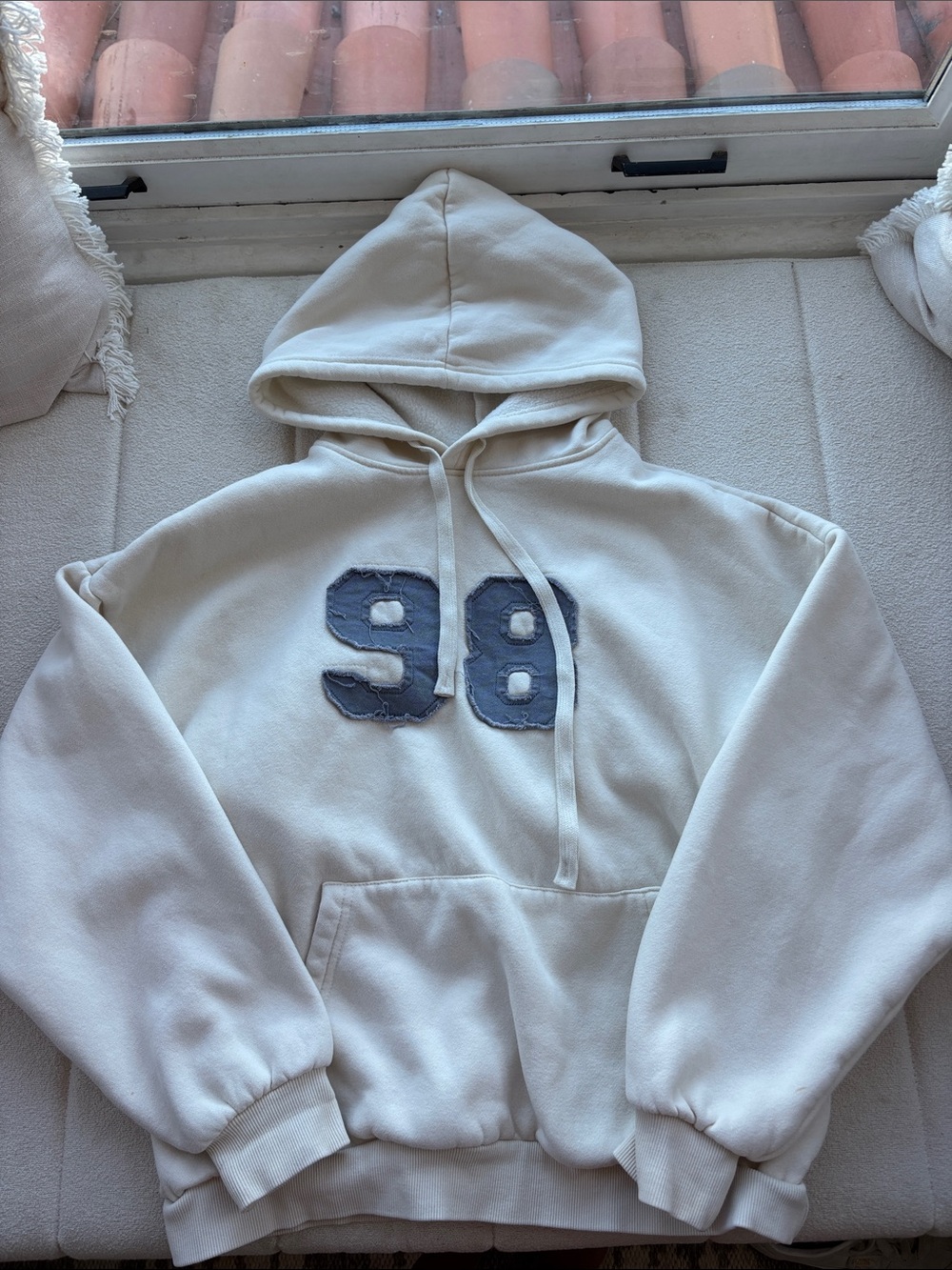 Edikted Cream Pullover Hoodie with Navy '98' Patch